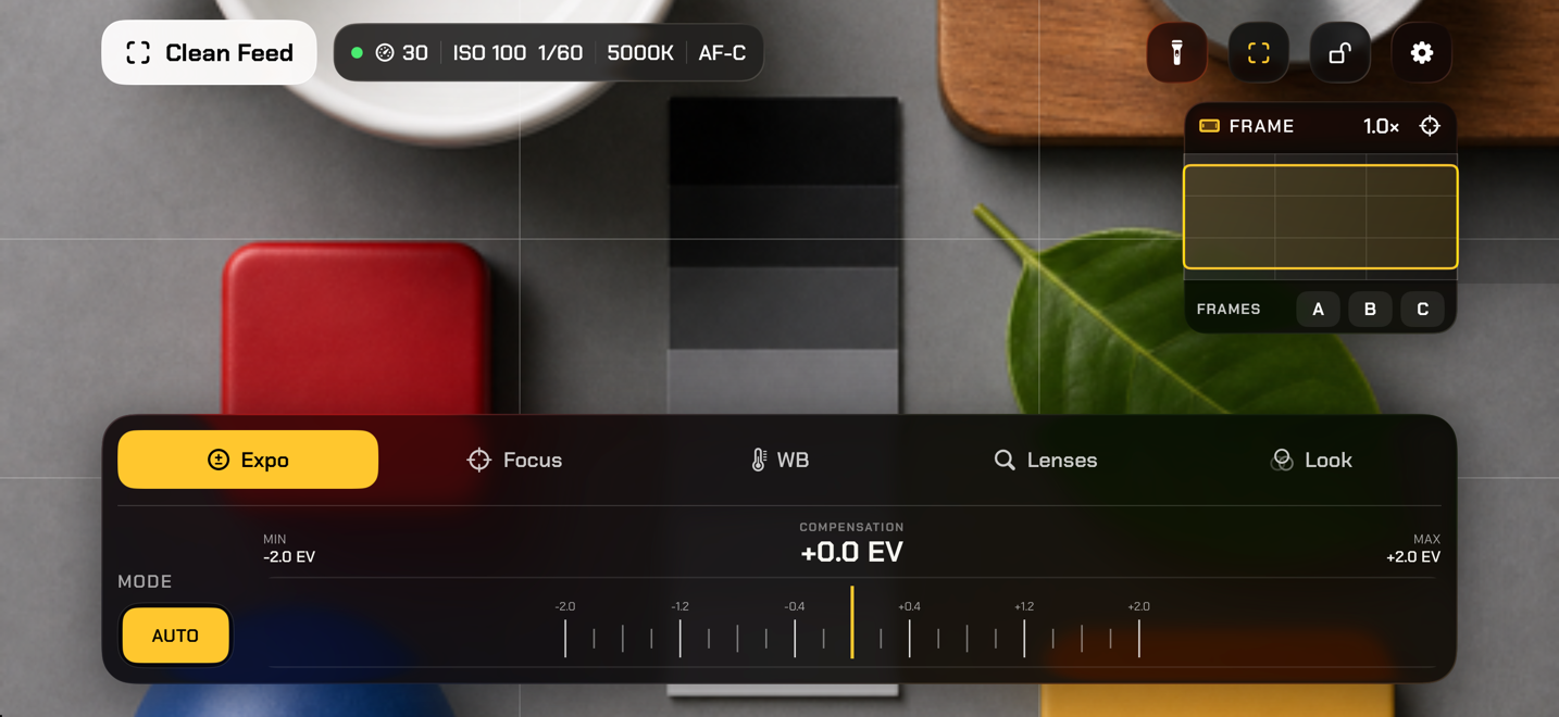 Overhead camera controls over a tabletop product shot